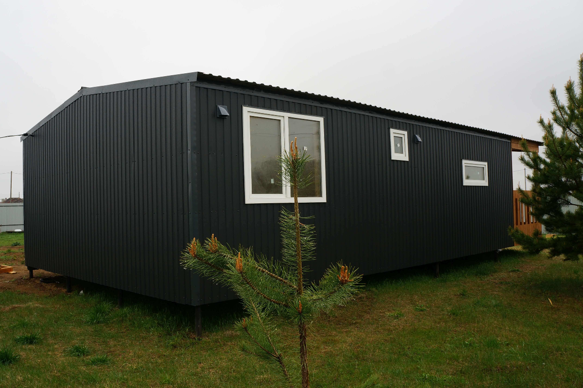 Одноэтажный каркасный дом с террасой 66 м²